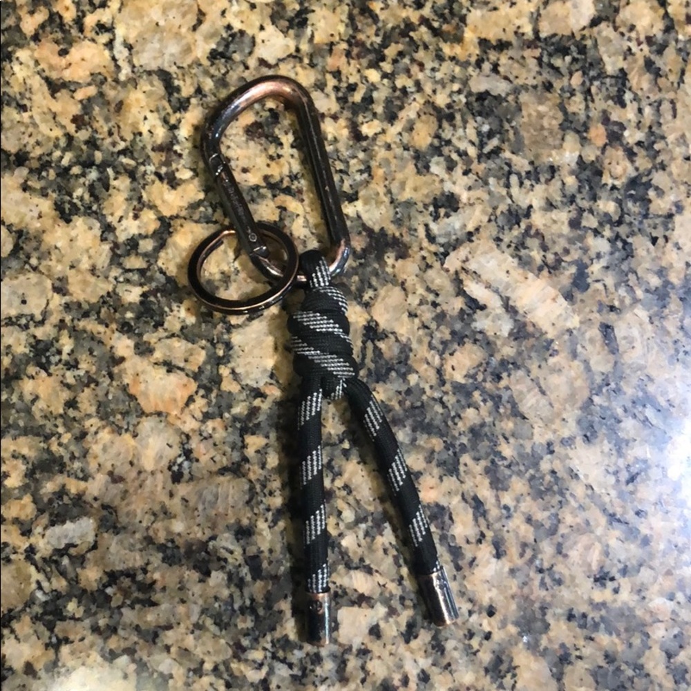 Black lululemon You Hold the Keychain